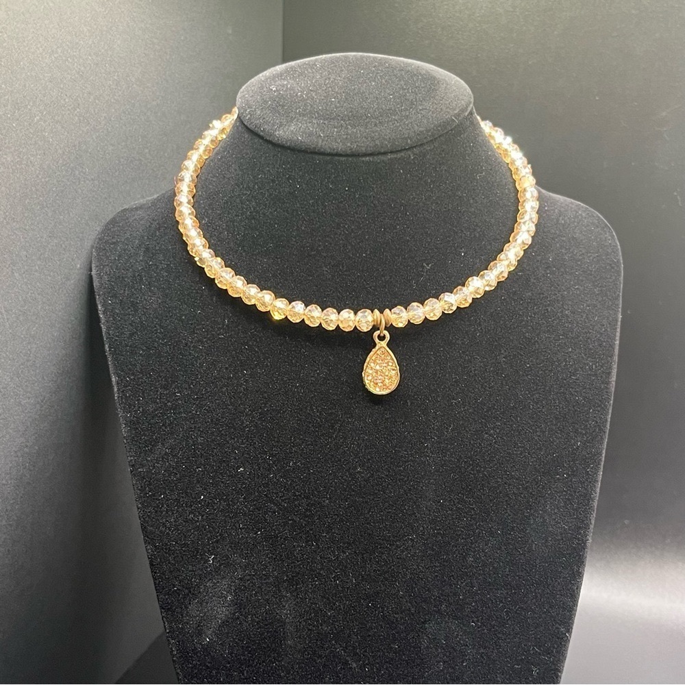 Modern light amber colored crystal choker with a teardrop rhinestone pendant. - Picture 9 of 9